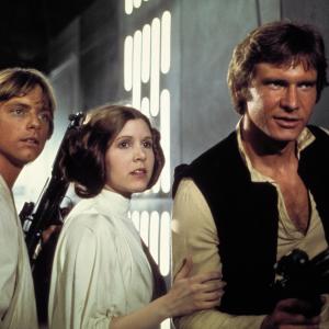 Still of Harrison Ford, Carrie Fisher and Mark Hamill in Zvaigzdziu karai (1977)
