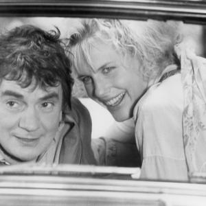 Still of Daryl Hannah and Dudley Moore in Crazy People 1990