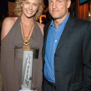 Charlize Theron and Woody Harrelson