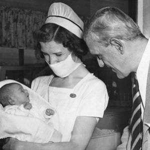 Boris Karloff with infant daughter