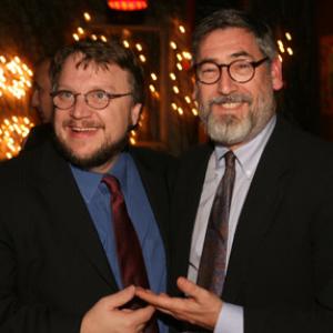 John Landis and Guillermo del Toro at event of Pans Labyrinth 2006