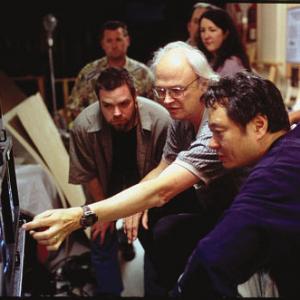 VFX Supervisor DENNIS MUREN discusses with Director ANG LEE.