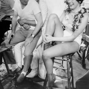 Great Race The Jack Lemmon and Tony Curtis with one of the chorus girls Photo taken in 1964  Warner Bros