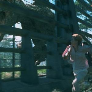 Amanda Kirby tries to outrun the Spinosaurus