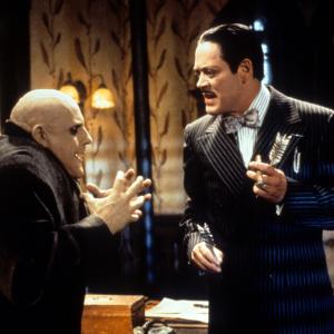 Still of Raul Julia and Christopher Lloyd in Addams Family Values 1993