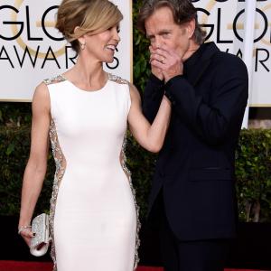 William H. Macy and Felicity Huffman at event of 72nd Golden Globe Awards (2015)