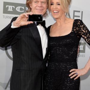 Actors William H. Macy (L) and Felicity Huffman take a selfie photo at the 2014 AFI Life Achievement Award: A Tribute to Jane Fonda at the Dolby Theatre on June 5, 2014 in Hollywood, California.