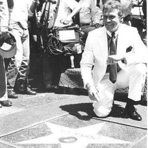 Lee Majors receiving his star on Hollywood's walk of fame.