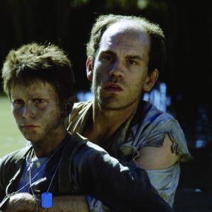 Still of Christian Bale and John Malkovich in Saules imperija 1987