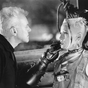 Still of Malcolm McDowell and Lori Petty in Tank Girl 1995