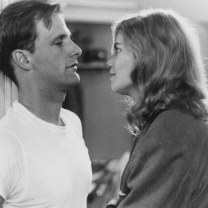 Still of Kelly McGillis and Jeff Daniels in The House on Carroll Street 1988