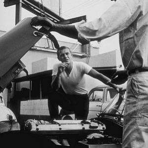 Steve McQueen talking to his XKSS Jaguar mechanic