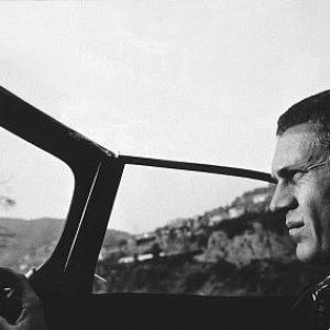 Steve McQueen driving his 1957 XKSS Jaguar in Bell Canyon