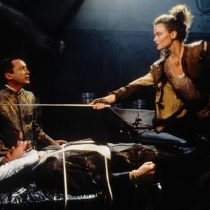 Still of Keanu Reeves, Dina Meyer and Udo Kier in Johnny Mnemonic (1995)