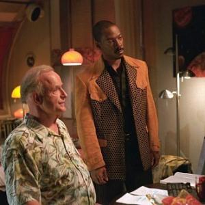 Still of Eddie Murphy and Peter Boyle in The Adventures of Pluto Nash (2002)