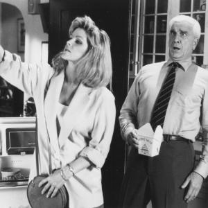 Still of Leslie Nielsen and Priscilla Presley in The Naked Gun From the Files of Police Squad! 1988