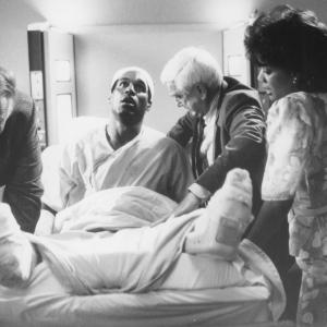 Still of Leslie Nielsen George Kennedy OJ Simpson and Susan Beaubian in The Naked Gun From the Files of Police Squad! 1988