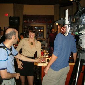 Alexandra Paul with actor Bryan Fisher and camera operator Adam Metzler on the set of Hes Such a Girl 2007