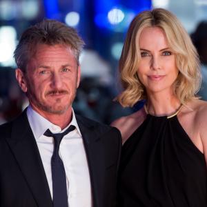 Charlize Theron and Sean Penn at event of The Gunman 2015