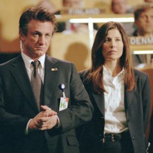 SEAN PENN as federal agent Tobin Keller and CATHERINE KEENER as his partner agent Dot Woods in The Interpreter a suspenseful thriller of international intrigue set inside the political corridors of the United Nations