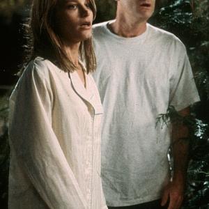 Still of Bridget Fonda and Bill Pullman in Lake Placid 1999