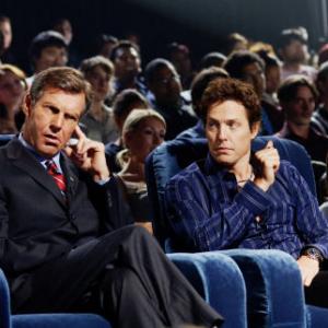 Still of Hugh Grant and Dennis Quaid in American Dreamz (2006)