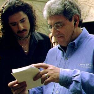 Brendan Fraser consults with director Harold Ramis