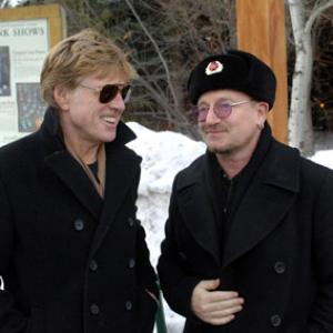 Robert Redford and Bono at event of U2 3D 2007