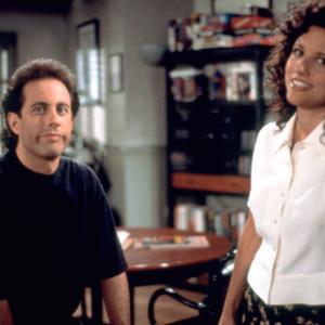 Still of Julia LouisDreyfus and Jerry Seinfeld in Seinfeld 1989