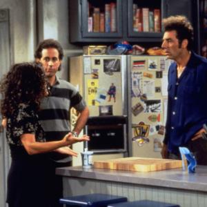 Still of Julia LouisDreyfus Jerry Seinfeld and Michael Richards in Seinfeld 1989