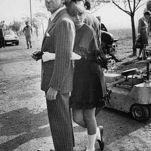 Peter Sellers with Britt Ekland on the set of The Bobo