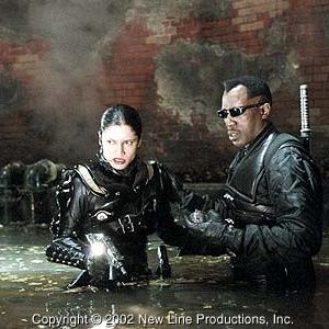 Nyssa (Leonor Varela, left) and Blade (Wesley Snipes) trapped in the tunnels of New Line Cinema's action thriller, BLADE II.