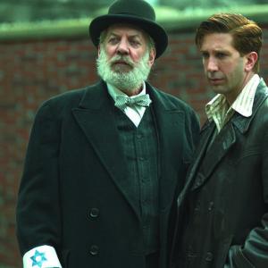 Still of Donald Sutherland and David Schwimmer in Uprising (2001)