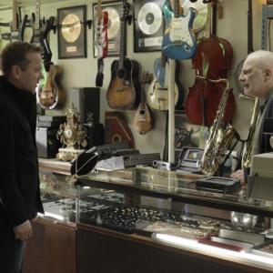 Still of Kiefer Sutherland and Jude Ciccolella in Touch 2012