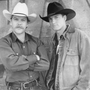 Still of Woody Harrelson and Kiefer Sutherland in The Cowboy Way 1994