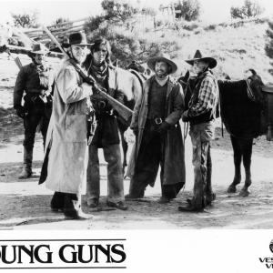 Still of Emilio Estevez Kiefer Sutherland Lou Diamond Phillips and Casey Siemaszko in Young Guns 1988
