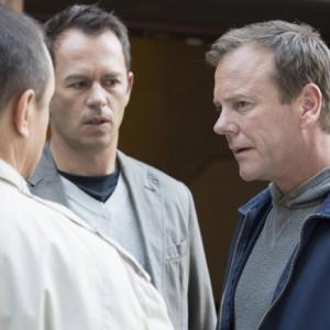 Still of Kiefer Sutherland and Greg Ellis in Touch 2012