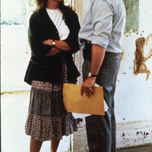 Still of Debra Winger and John Heard in Betrayed 1988