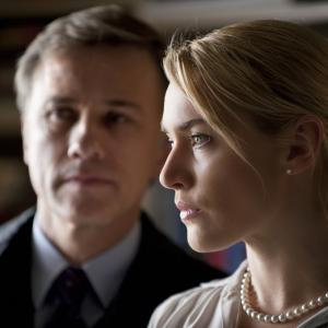 Still of Kate Winslet and Christoph Waltz in Kivircas 2011