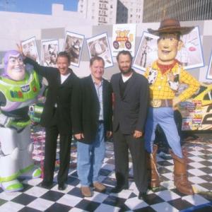 Tom Hanks Tim Allen and John Lasseter at event of Zaislu istorija 2 1999