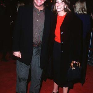Tom Arnold and Julie Armstrong at event of One Fine Day 1996