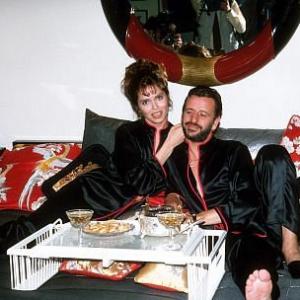 Ringo Starr and Wife Barbara Bach having a little snack in bed.