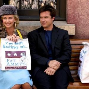 Still of Charlize Theron and Jason Bateman in Arrested Development 2003