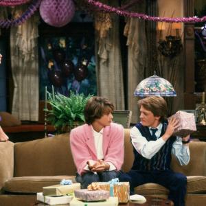 Still of Michael J Fox Justine Bateman Meredith Baxter and Michael Gross in Family Ties 1982