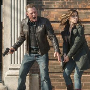 Still of Jason Beghe and Sophia Bush in Chicago PD 2014