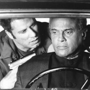 Still of John Travolta and Harry Belafonte in White Mans Burden 1995