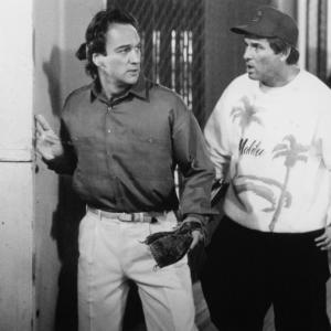 Still of James Belushi and Charles Grodin in Taking Care of Business 1990