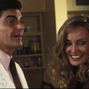 Still of Richard Benjamin and Jessica Lange in How to Beat the High Cot of Living 1980