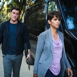 Still of Halle Berry and Owain Yeoman in Extant 2014
