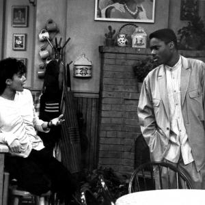 Still of Lisa Bonet and MalcolmJamal Warner in The Cosby Show 1984